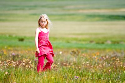 Girl in a field of flowers