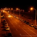 Night-time view of Beach Road in Mouille Point