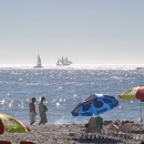 Beach weather and sailing ships