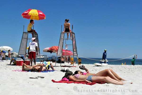 Girls and lifeguards on Clifton beach