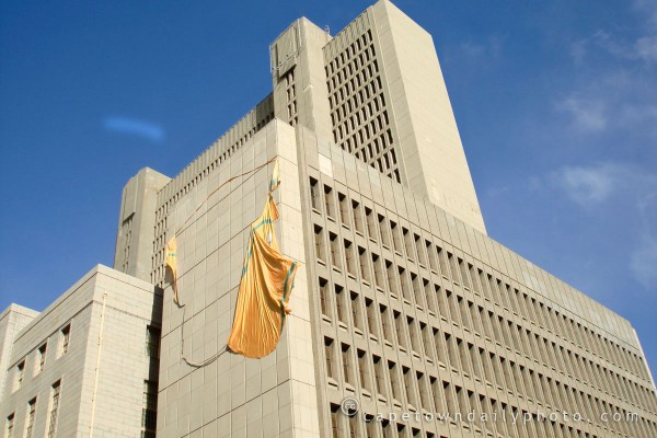 Banner torn by high winds