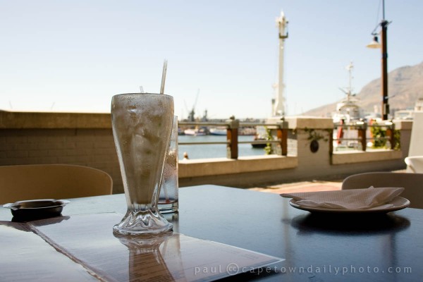 An empty milkshake glass