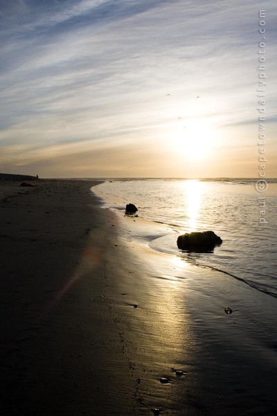 Sea, sand, and a setting sun