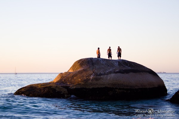 Three guys on a rock