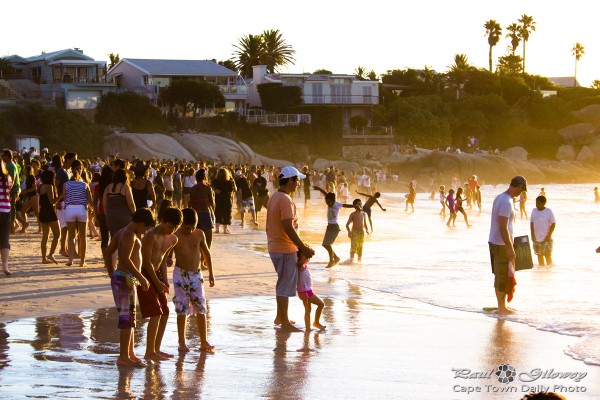 People at the beach at sunset