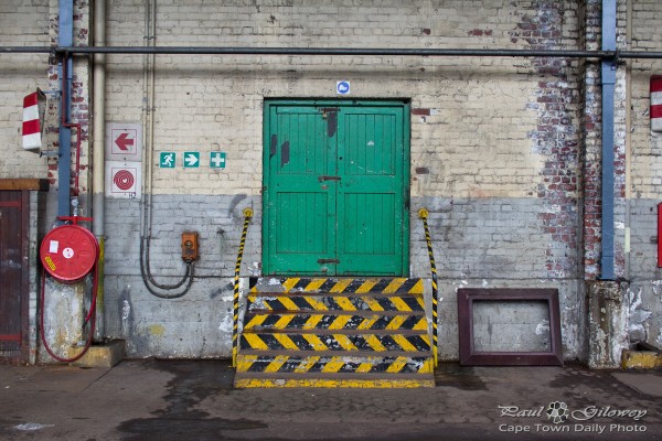Green doors and chevron stairs