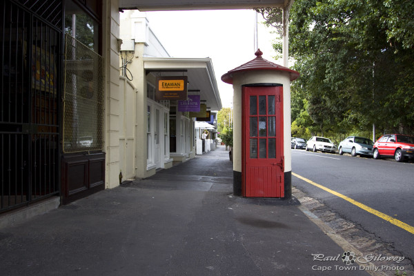 A really old telephone booth