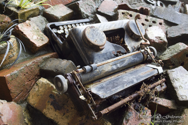 The Wall: Rusted old typewriter
